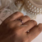 Handcrafted minimal silver ring with rhodolite garnet accent  