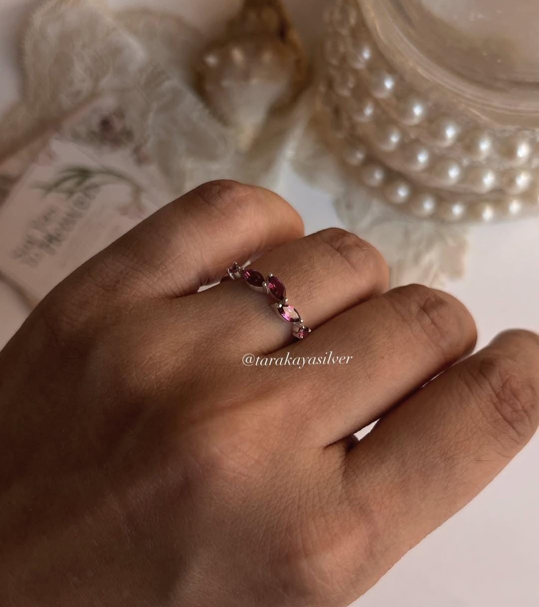 Minimalist 925 silver ring with rhodolite garnet and leaf design  