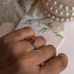 Elegant silver ring with leaf detail and rhodolite garnet  