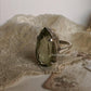 Sterling silver solitaire ring with vibrant green amethyst  