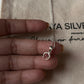 Small crescent moon necklace with garnet charm in silver