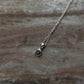 Delicate crescent moon necklace with labradorite in sterling silver