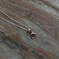 Handcrafted garnet crescent moon pendant in 925 silver