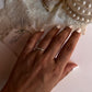 Rope texture silver band with white topaz trio stones  