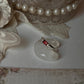 Elegant garnet solitaire ring in sterling silver with baguette cut  