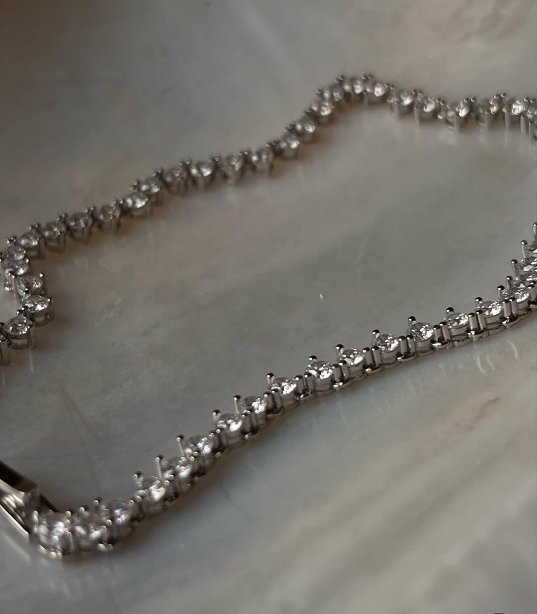 Sterling silver tennis anklet with CZ solitaire stones  