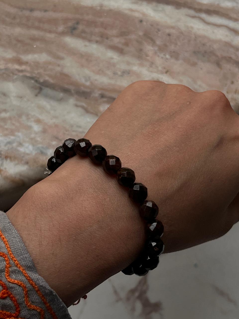 8mm faceted garnet crystal bracelet for strength and passion  