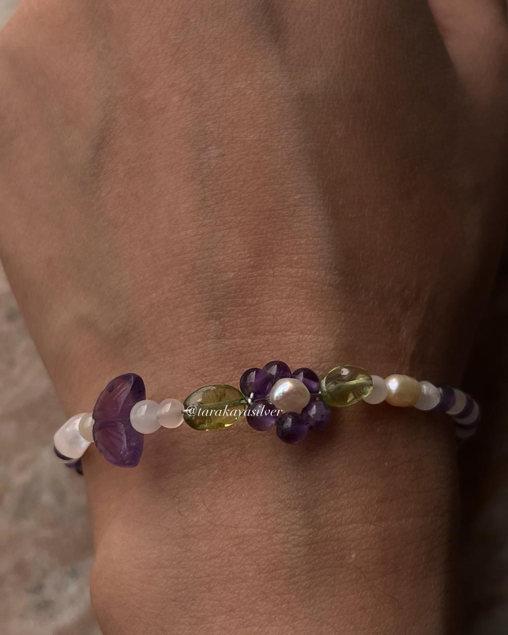 Elegant floral silver bracelet with vibrant natural gemstones  