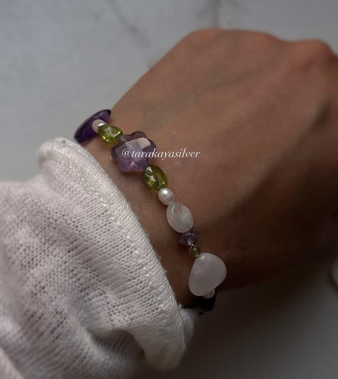 Nature-inspired floral silver bracelet with handcrafted detailing