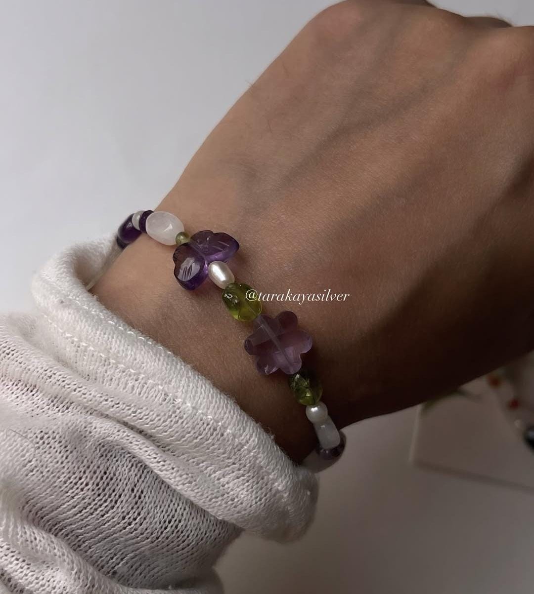 Whimsical handcrafted silver bracelet with floral garden theme  
