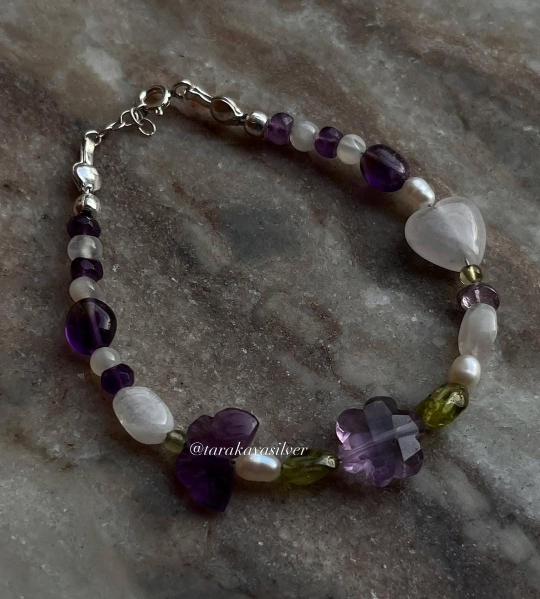 Natural silver bracelet with intricate floral garden accents