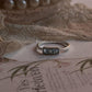 Handcrafted blue topaz silver ring with 3-stone design  