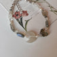 Handcrafted silver bracelet with wing motif for personal transformation