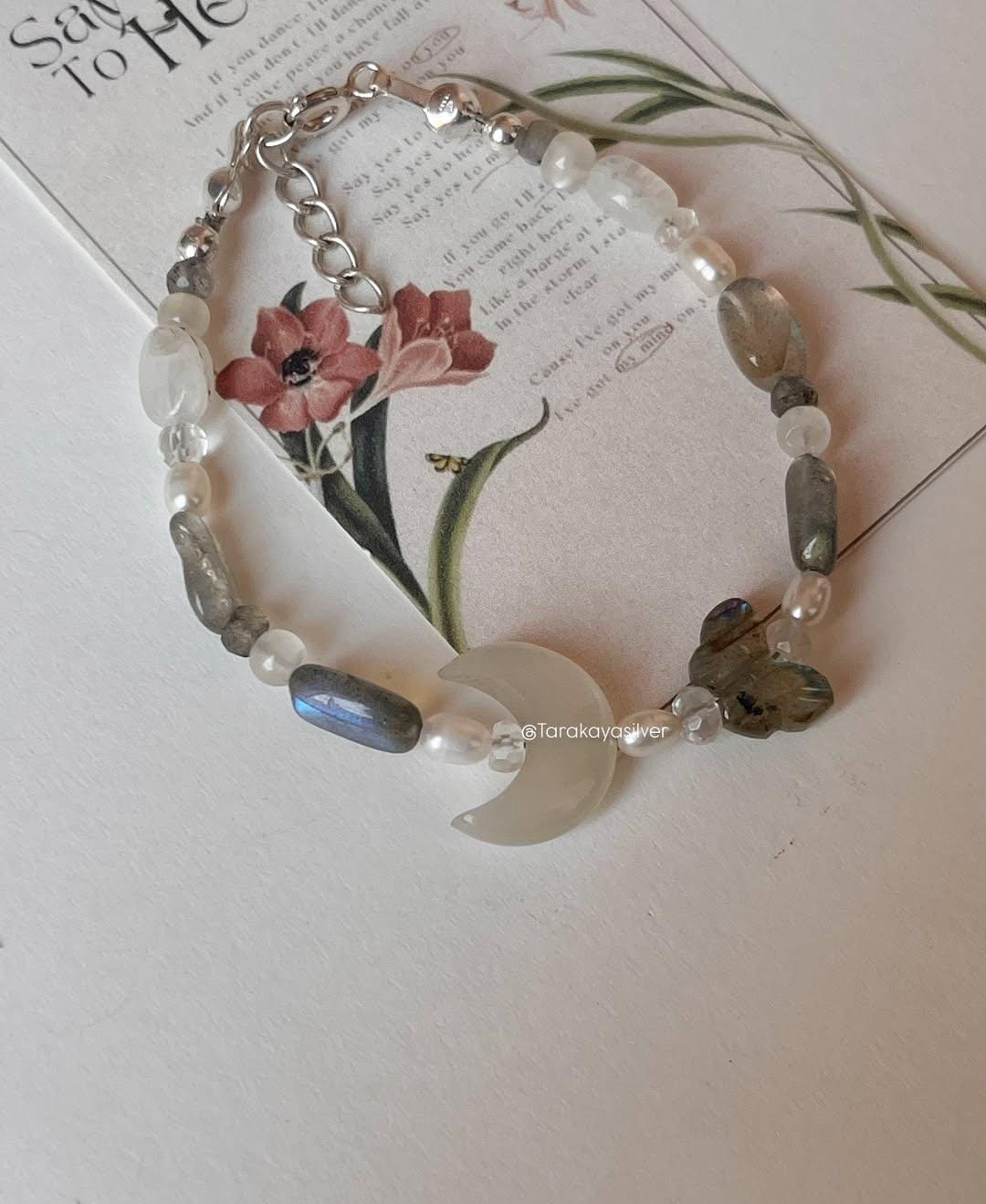 Handcrafted silver bracelet with wing motif for personal transformation