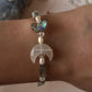 Winged design handcrafted silver bracelet for a bold, spiritual look