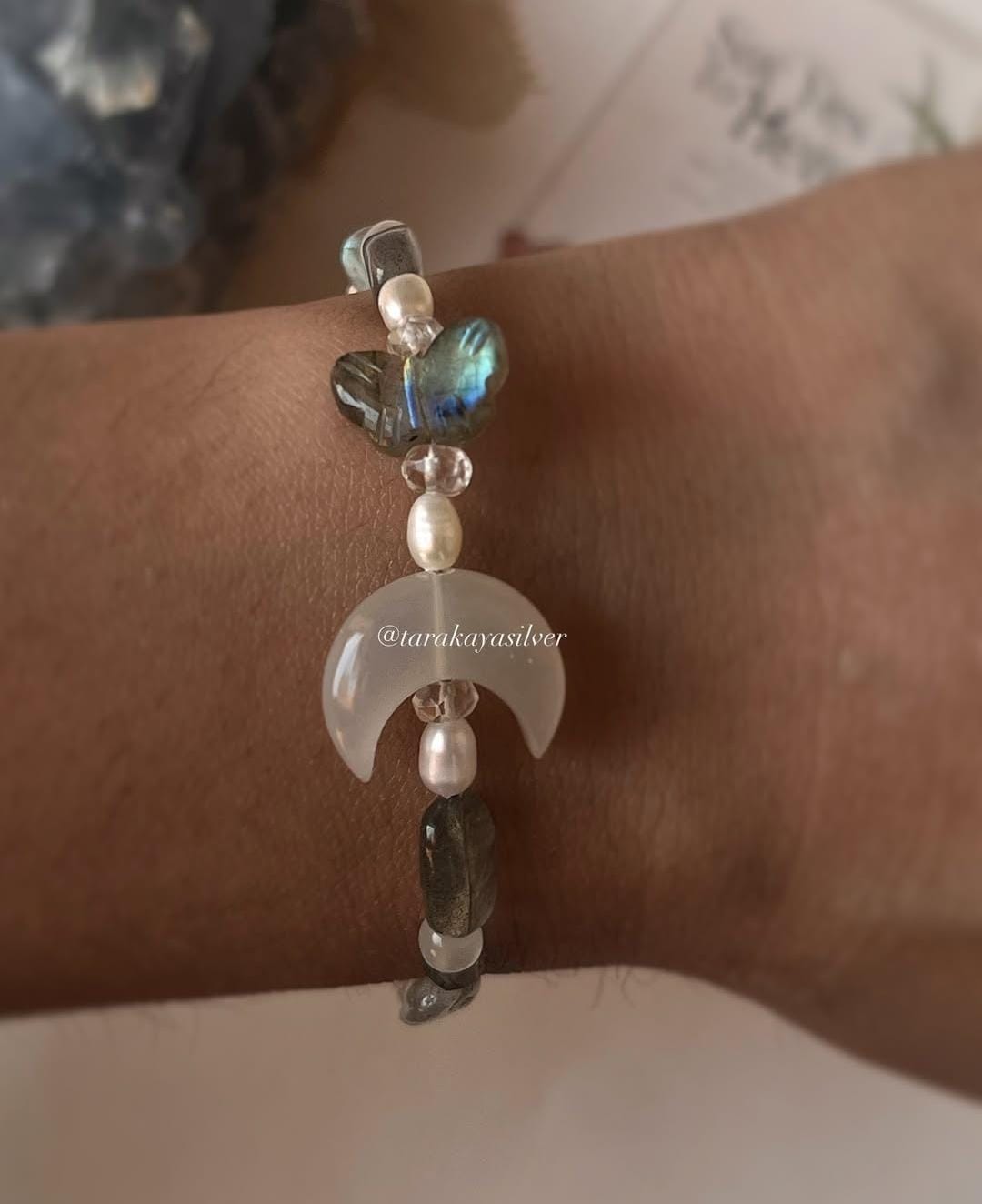 Winged design handcrafted silver bracelet for a bold, spiritual look