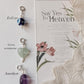 Evil eye, green aventurine heart, and amethyst tumble crystal charm set  