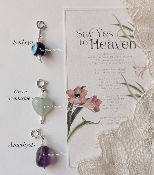 Evil eye, green aventurine heart, and amethyst tumble crystal charm set  