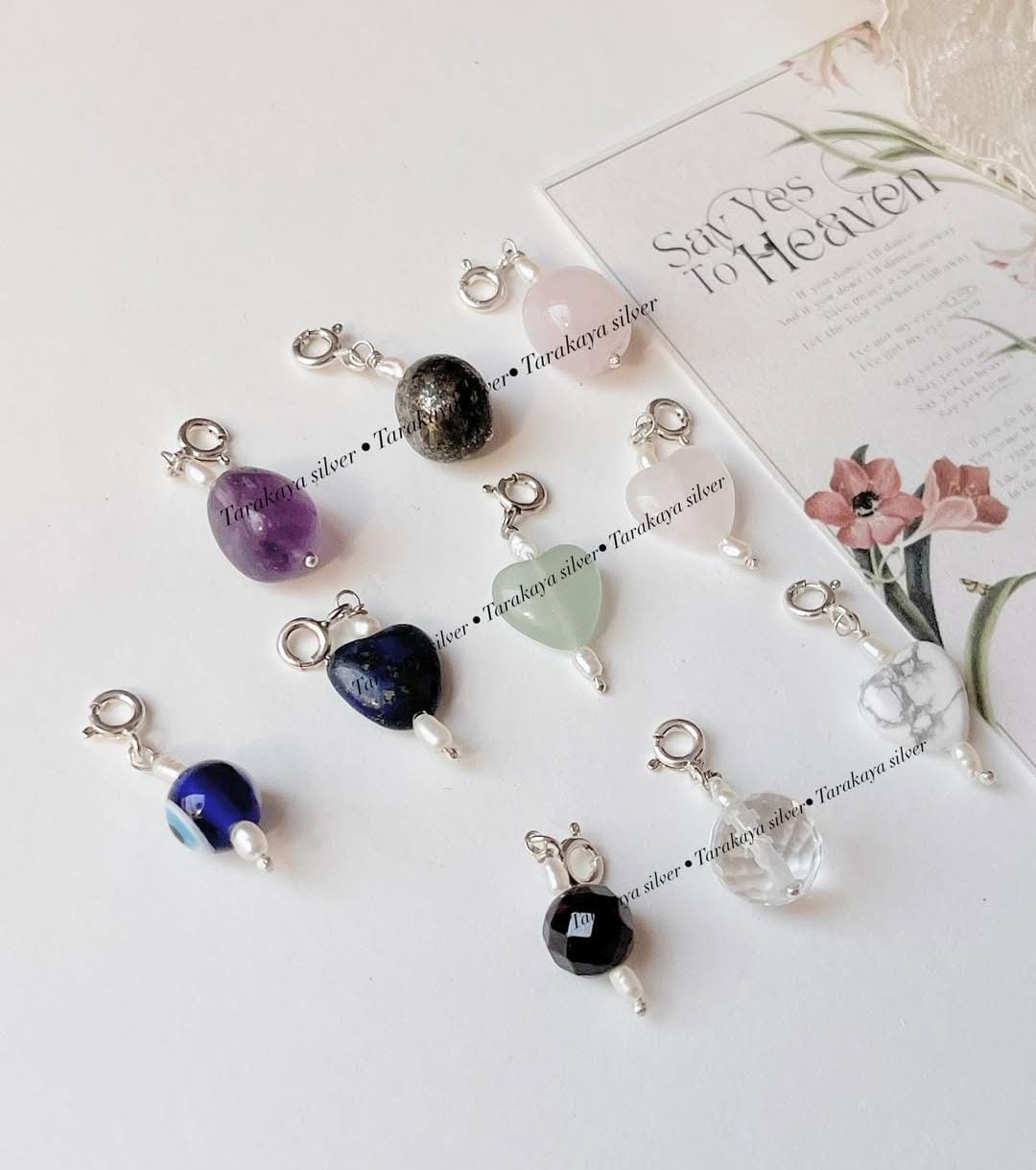 Silver charm set with 10 healing crystals and pearls