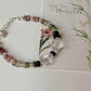  Multi-tourmaline and quartz bracelet with ethereal floral design