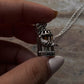 Elegant 3D silver pigeon in cage pendant, handmade and hallmarked 925 silver, perfect gift idea for any occasion.