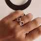 Elegant silver ring with infinity twist design  