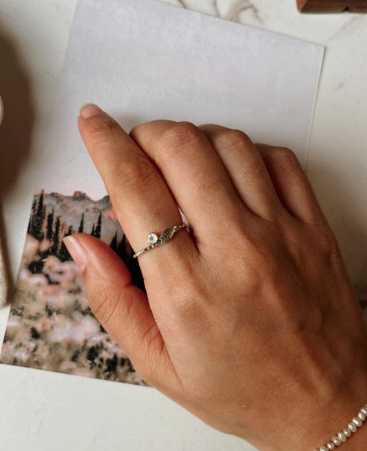 Detailed view of 925 Sterling Silver forest-themed ring with moonstone centerpiece