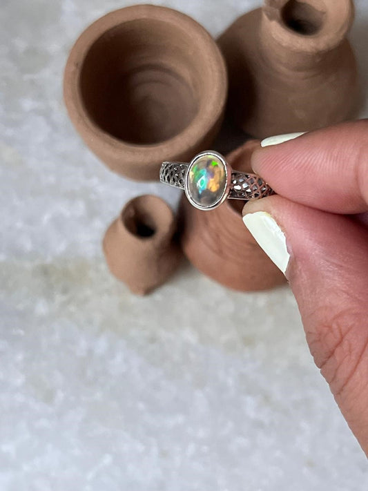 Handmade 925 sterling silver band ring with opal and decorative pattern design  