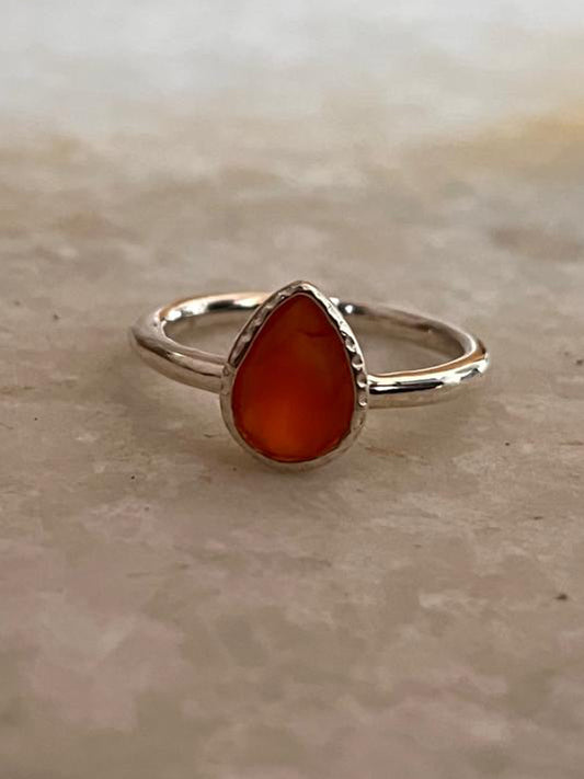 Handmade 925 sterling silver ring featuring pear-cut carnelian stone