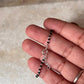 Handcrafted black bead anklet with silver ends  