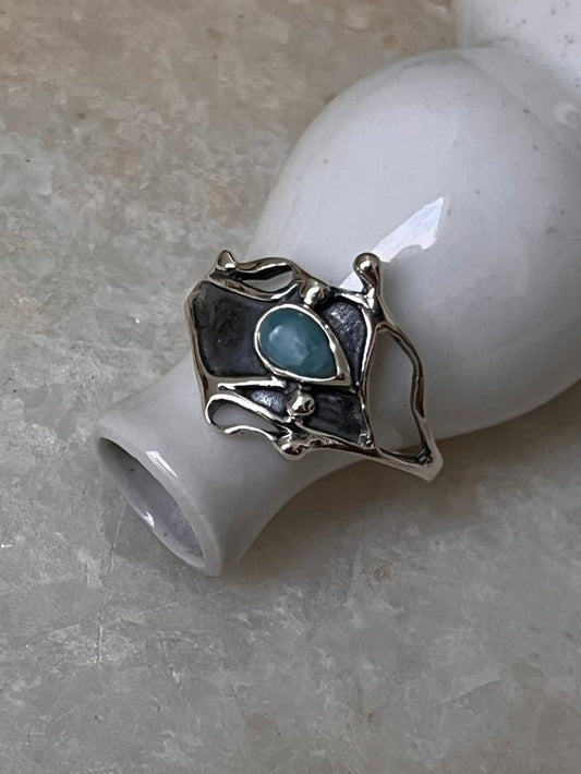 Artisan-crafted molten-style 925 Sterling Silver ring with larimar  