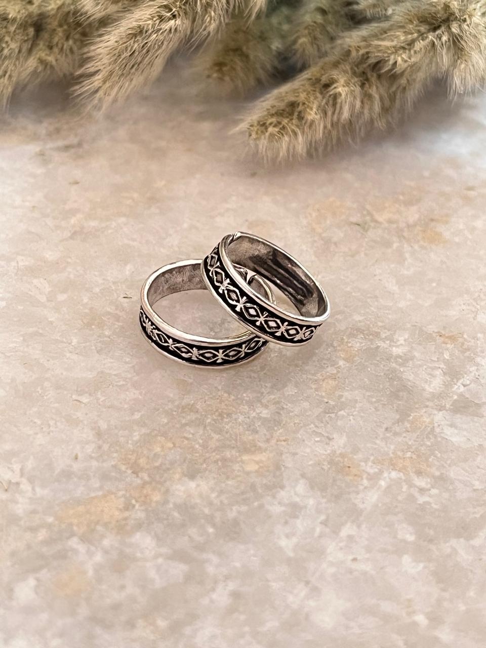 Oxidized silver toe ring with tribal design
