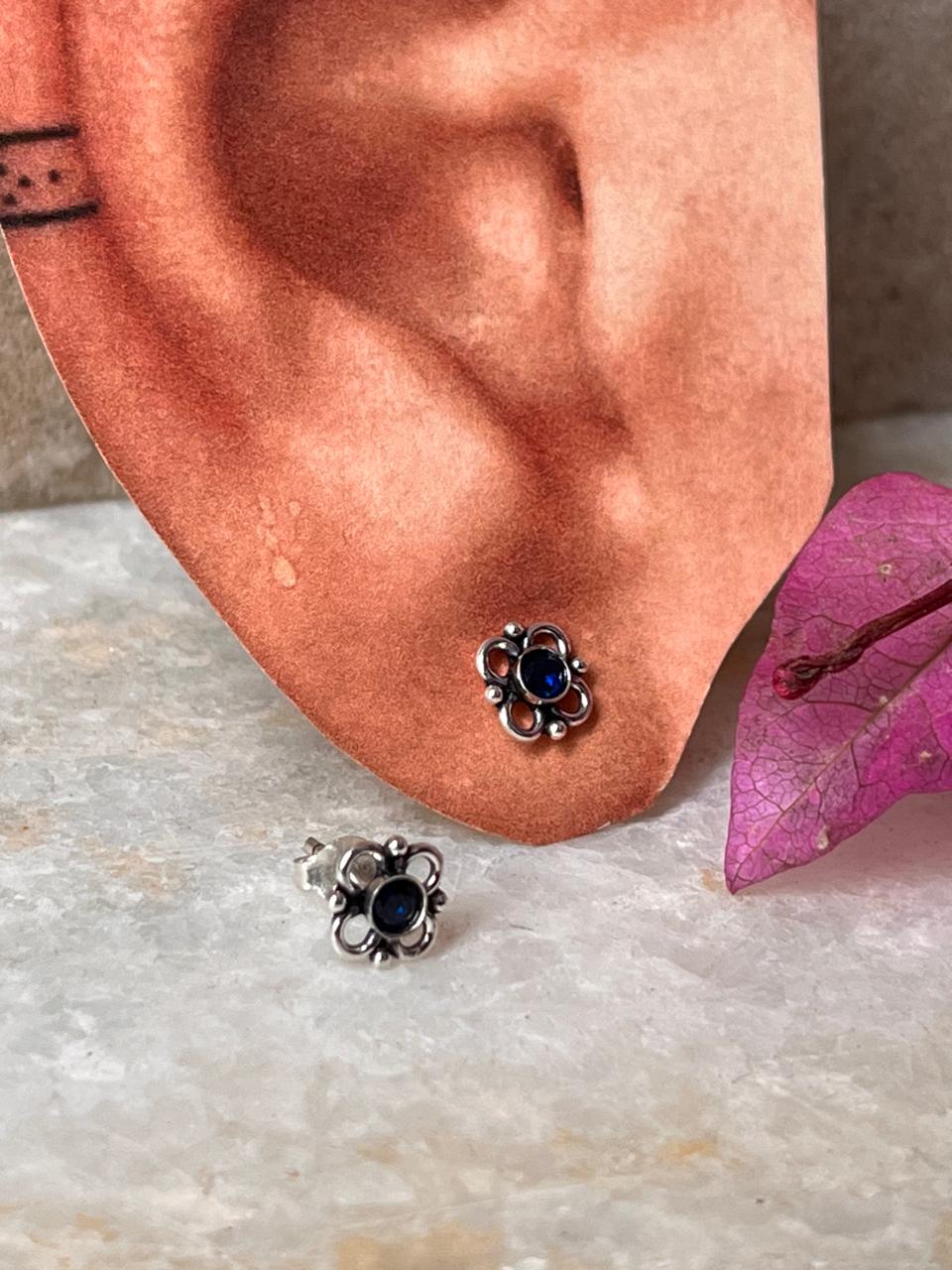 Delicate 925 silver floral studs with blue cubic zirconia  