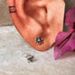 Elegant sterling silver floral stud earrings with white CZ  