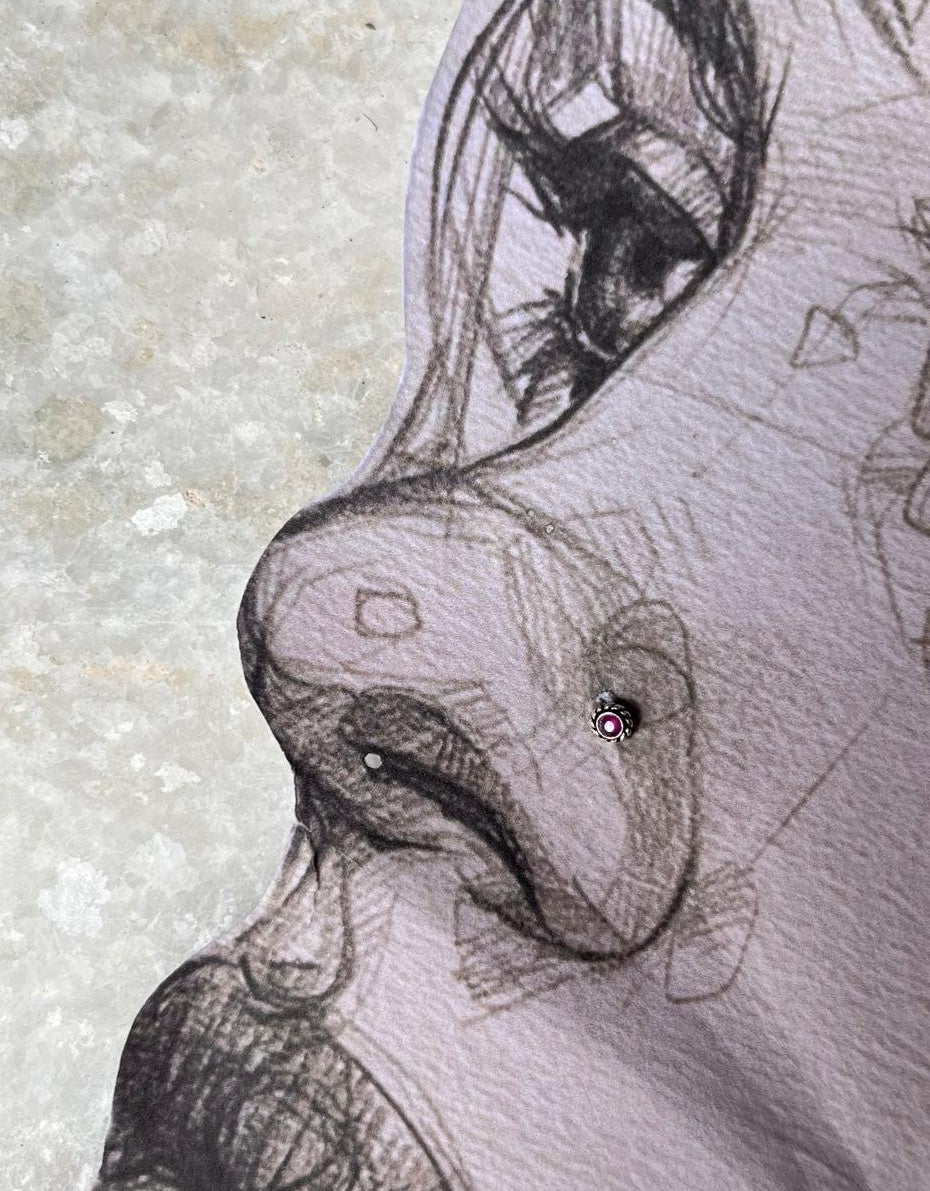 Handcrafted tribal rawa nose pin with pink CZ stone  