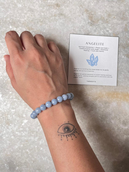Light blue angelite bracelet with round 8MM beads  