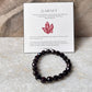 Diamond cut garnet bead bracelet with natural crystals