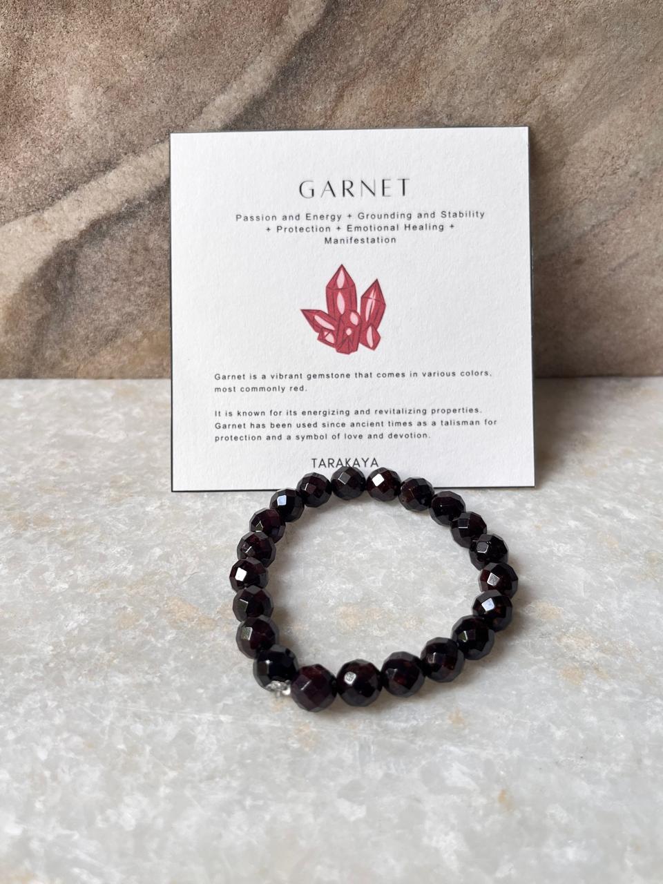 Diamond cut garnet bead bracelet with natural crystals