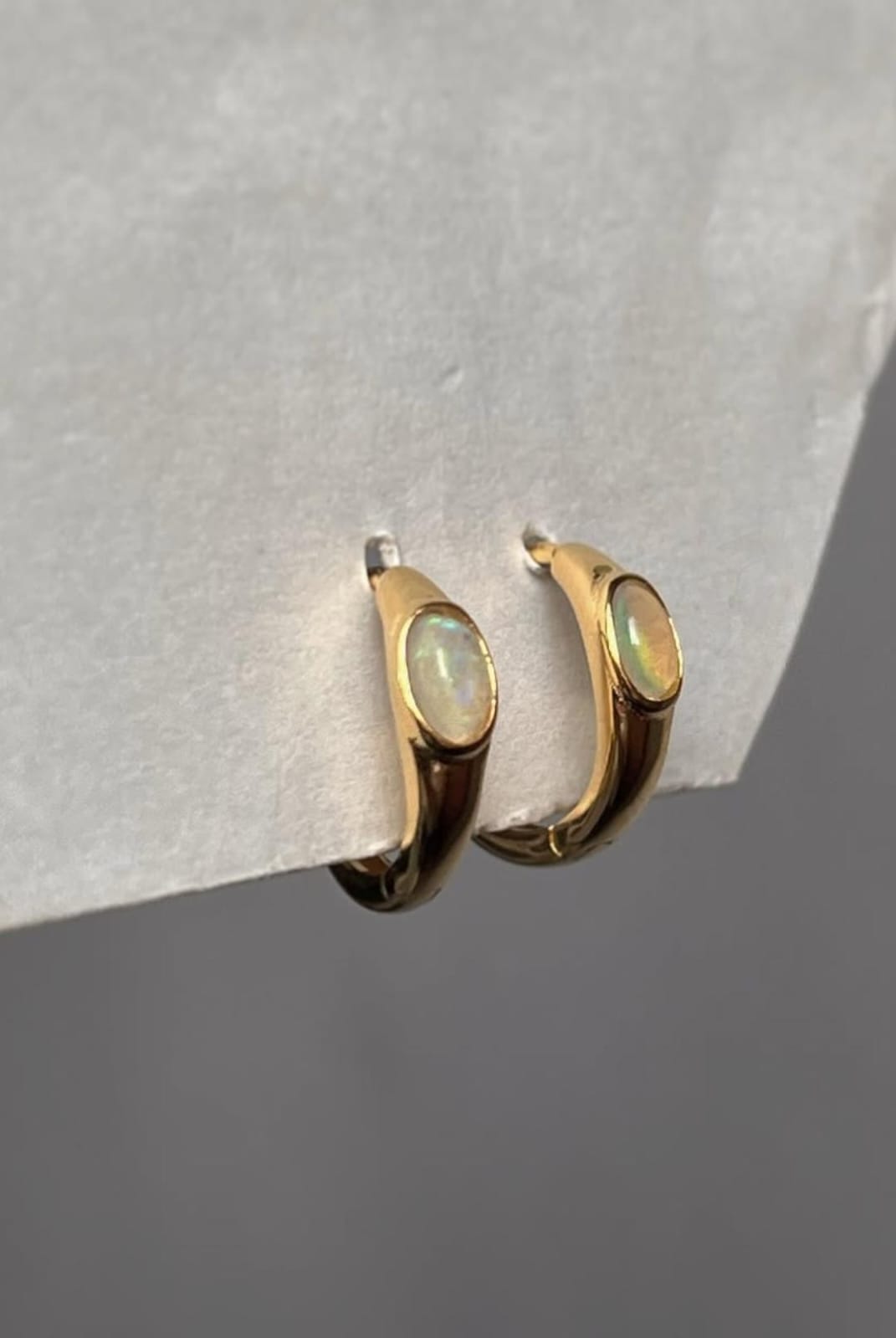 Dainty gold vermeil oval huggie earrings with Ethiopian opal