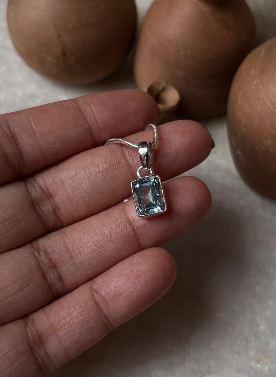 Elegant Blue Topaz Rectangular Pendant in Sterling Silver
