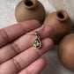 Faceted Peridot Drop Pendant in Silver Setting  