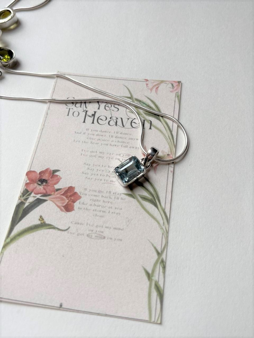 Natural Blue Topaz Rectangle Pendant in Silver Setting 