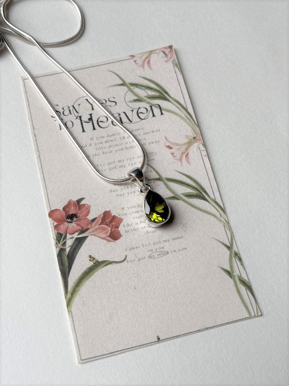 Elegant Teardrop Peridot Pendant in Sterling Silver