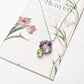 Gemstone Necklace with Amethyst Flower and Peridot Charm  
