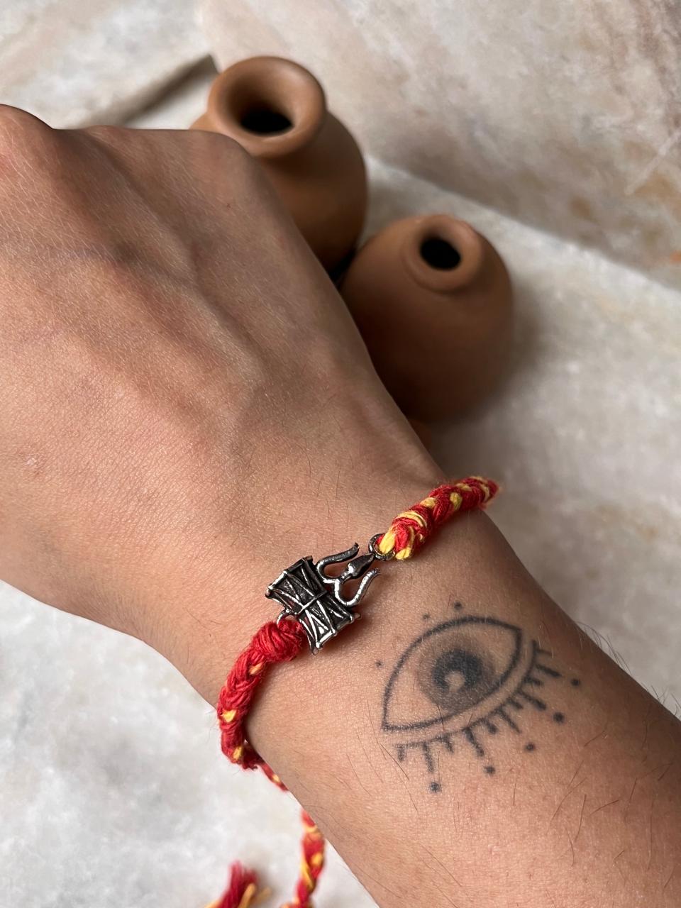 Handcrafted Trishul and Damru Silver Rakhi in 925 Sterling 