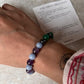Zodiac-themed Aquarius bracelet with energy crystal  