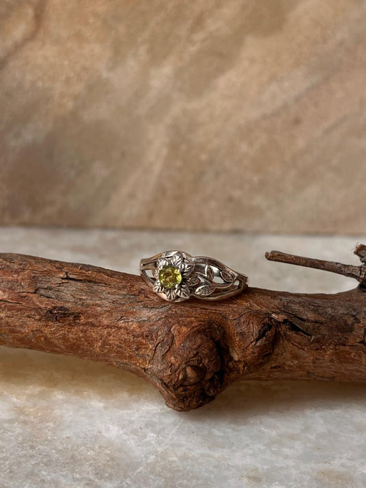 Handmade 925 sterling silver ring featuring peridot gemstone with woodland motifs