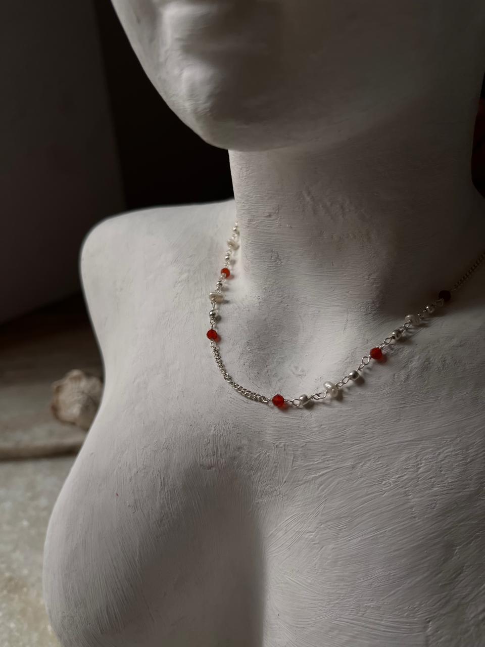 Delicate handcrafted necklace with red onyx and pearls  