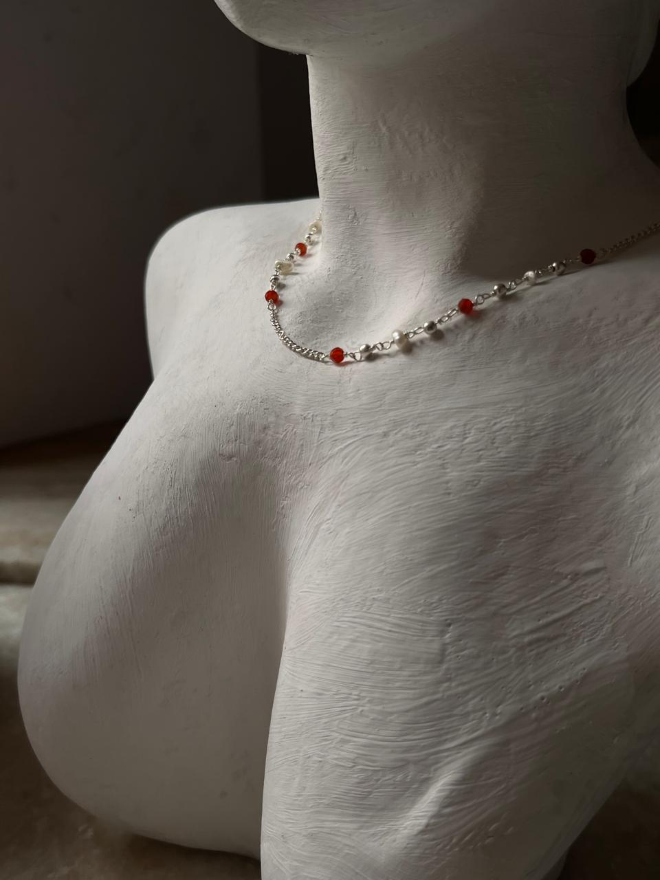 Handcrafted 925 silver necklace featuring red onyx and pearls  