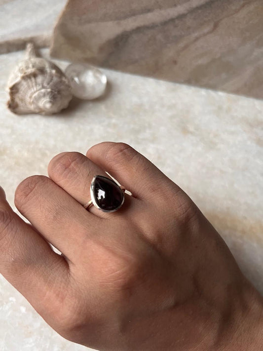 925 sterling silver Garnet Pear Plain Big Ring showcased on a hand, highlighting deep red garnet stone.